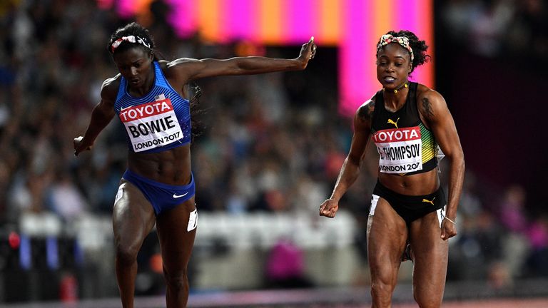 LONDON, ENGLAND - AUGUST 06:  Tori Bowie of the United States crosses the finish line to win the Women's 100 Metres Final ahead of Elaine Thompson of Jamai
