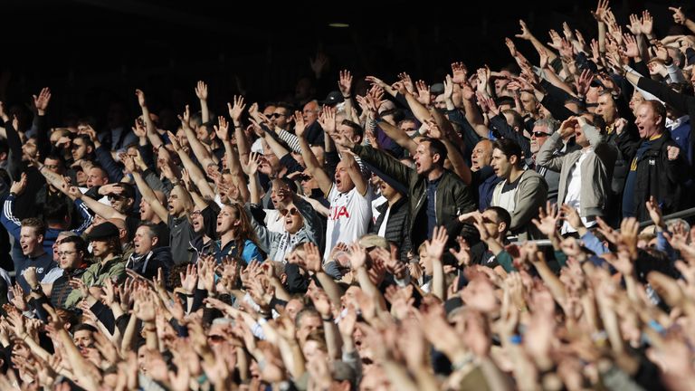 Tottenham Hotspurs fans cheer during the FA Cup semi-final football match between Tottenham Hotspur and Chelsea at Wembley stadium in London on April 22, 2