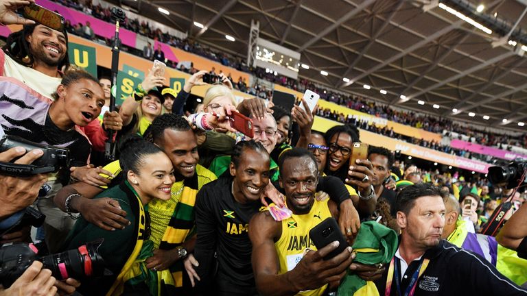 LONDON, ENGLAND - AUGUST 05:  Usain Bolt of Jamaica celebrates during a lap of honour following finishing in third place in the mens 100m final during day 