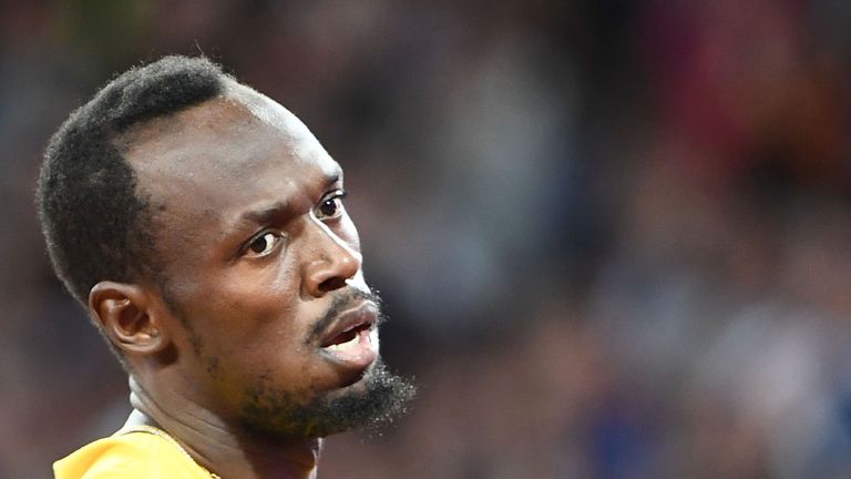 Jamaica's Usain Bolt reacts after the heats of the men's 100m athletics event at the 2017 IAAF World Championships at the London Stadium in London on Augus
