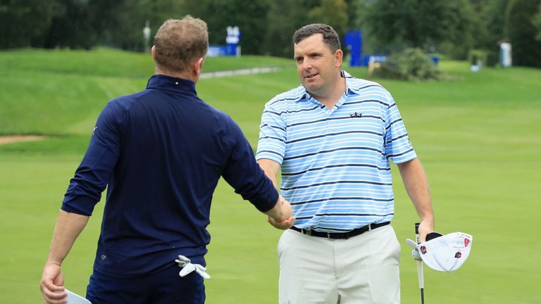 Jamie Donaldson (left) fell to a convincing last 16 defeat against Wall earlier on Saturday