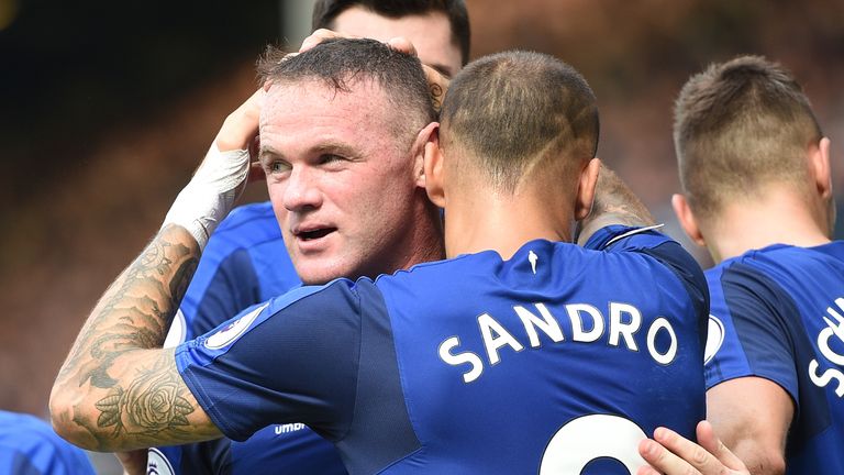 Wayne Rooney celebrates scoring the opening goal for Everton with team-mate Sandro Ramirez