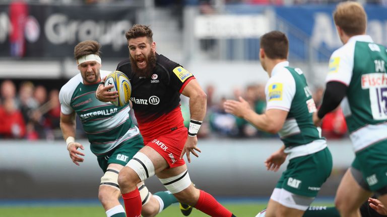 BARNET, ENGLAND - MAY 21:  Will Fraser of Saracens breaks through to score a try during the Aviva Premiership semi final match between Saracens and Leicest