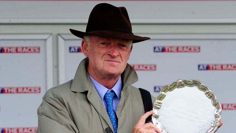 Willie Mullins collects the Leading Trainer Trophy for the 7 day Festival during Mad Hatters Day of the Galway Summer Festival 