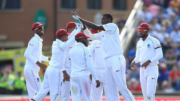 West Indies Jason Holder (second right) celebrates after taking the wicket of England's Tom Westley during day three of the the second Investec Test match 