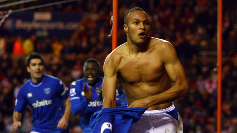 SUNDERLAND, ENGLAND - DECEMBER 12:  Younes Kaboul of Portsmouth takes his shirt off as he celebrates scoring a late equaliser during the Barclays Premier L