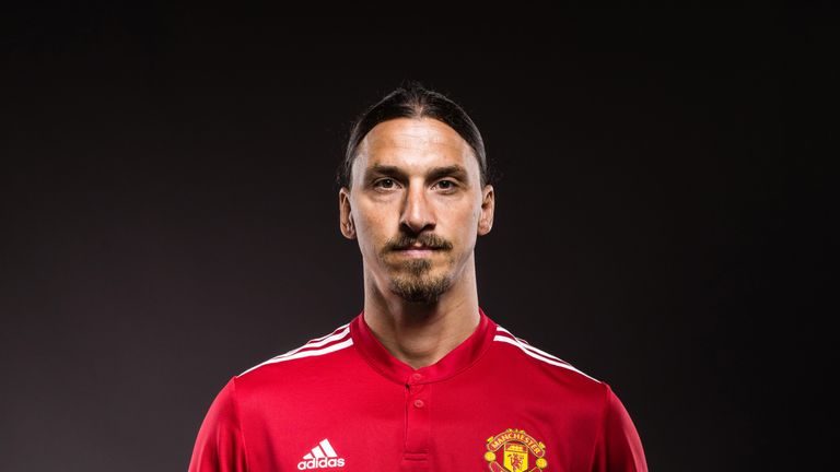 Zlatan Ibrahimovic poses after re-signing with Manchester United