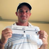 Sam Saunders holds his scorecard after firing a 59 in Florida