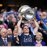 Dublin captain Stephen Cluxton lifts the Sam Maguire Cup after their 1-17 to 1-16 win over Mayo