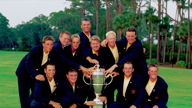 12 Aug 2001:  The victorious Great Britain & Ireland team with all hands on the Trophy after the 38th Walker Cup Match between Great Britain/Ireland and th