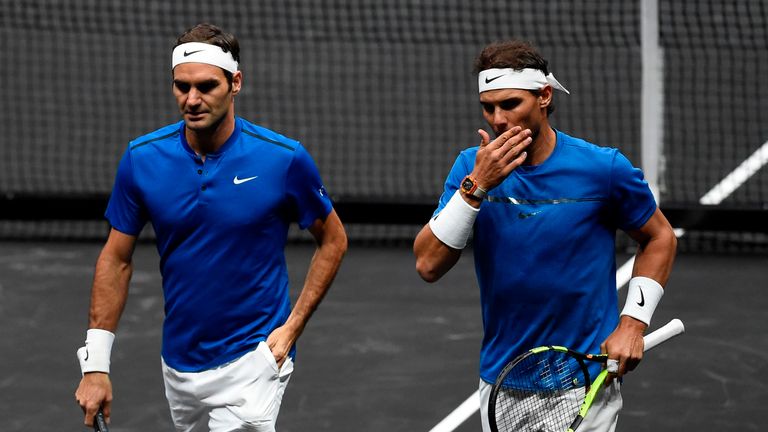 Swiss Roger Federer and Spanish Rafael Nadal of Team Europe talk during their match against Sam Querrey and Jack Sock of Team World during the Laver Cup on