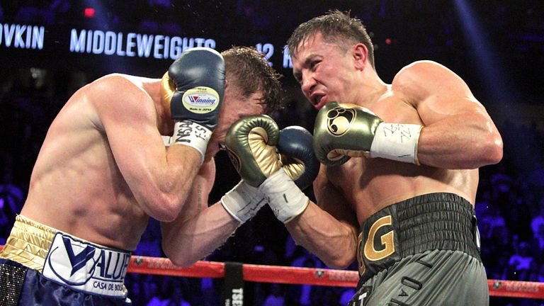 Gennady Golovkin (R) digs a right uppercut against Canelo Alvarez (L) during their WBC, WBA and IBF middleweight championship fight at the T-Mobile Arena o