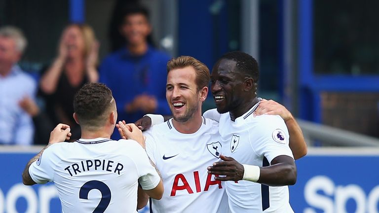Harry Kane (centre) completed a century of Tottenham goals in their 3-0 win at Everton in the Premier League
