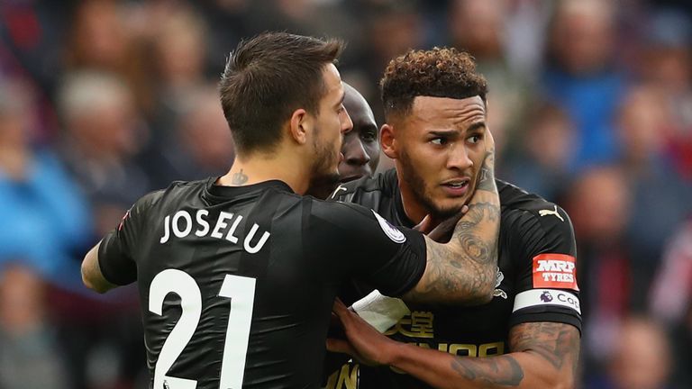 Newcastle captain Jamaal Lascelles celebrates his winning goal at Swansea with Joselu