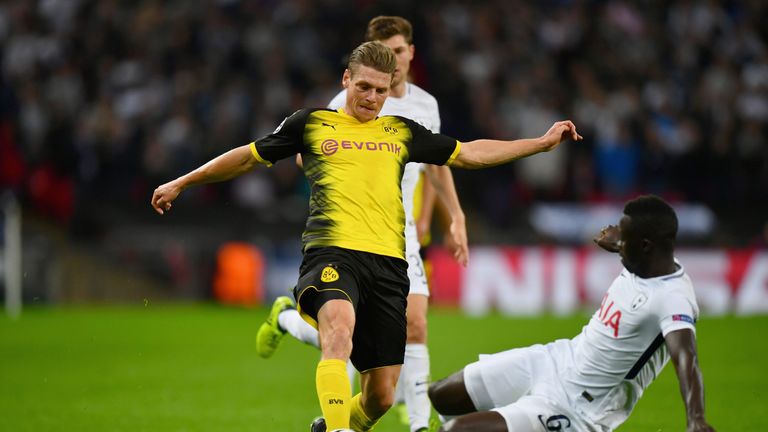 Lukasz Piszczek of Borussia Dortmund is tackled by Davinson Sanchez of Tottenham Hotspur during a UEFA Champions League game at Wembley in September 2017