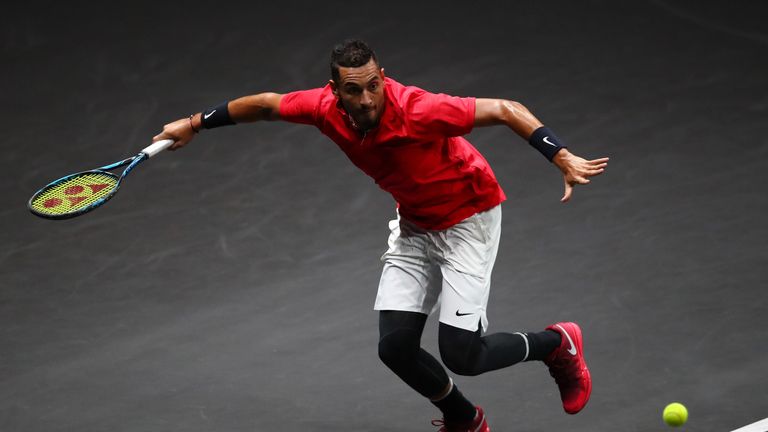 PRAGUE, CZECH REPUBLIC - SEPTEMBER 24:  Nick Kyrgios of Team World plays a forehand on the run during his mens singles match against Roger Federer of Team 