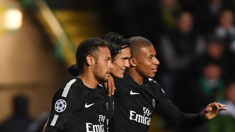 Neymar celebrates scoring his side's first goal with Edinson Cavani and Kylian Mbappe during Paris Saint-Germain's 5-0 win over Celtic in September 2017