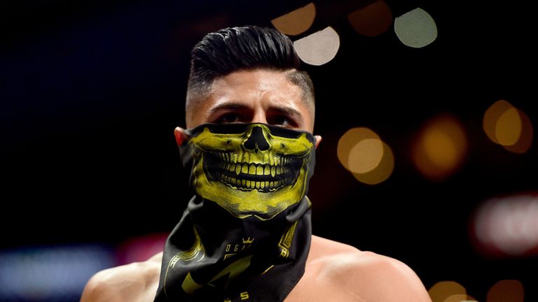 Abner Mares of Mexico enters the ring to fight Leo Santa Cruz during the WBC diamond featherweight and WBA featherweight champion.