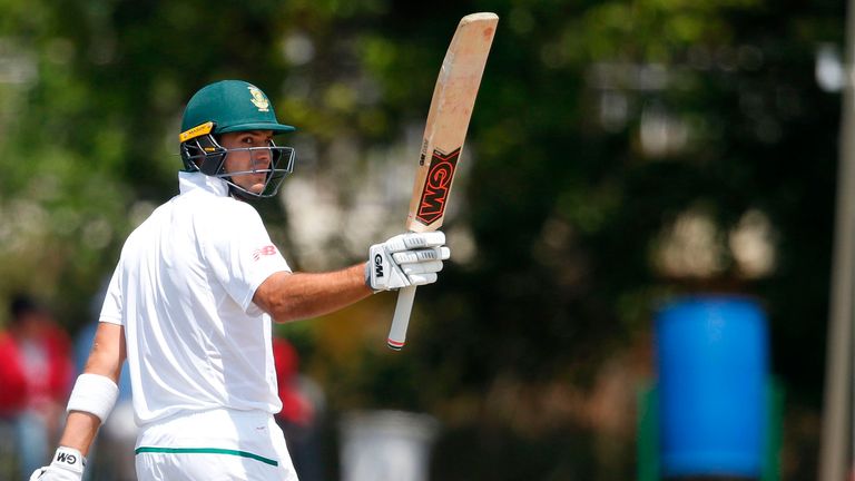 South African batsman Aiden Markram raises his bat as he celebrates scoring half century (50 Runs) during the first day of the first Test Match between Sou