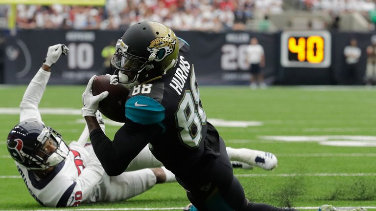 HOUSTON, TX - SEPTEMBER 10:  Allen Hurns #88 of the Jacksonville Jaguars catches a pass in the third quarter defended by Kevin Johnson #30 of the Houston 