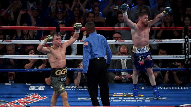 Gennady Golovkin and Canelo Alvarez both celebrate after the final round in their WBC, WBA and IBF middleweight title fight