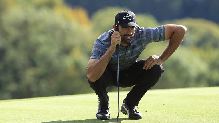 Alvaro Quiros of Spain lines up a putt on the 17th hole during day one of the British Masters at Close House 