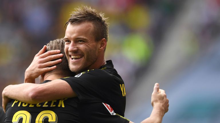 Dortmund's Polish defender Lukasz Piszcek (L) and Dortmund's Ukrainian striker Andrey Yarmolenko (R) celebrate after scoring the first goal during the Germ