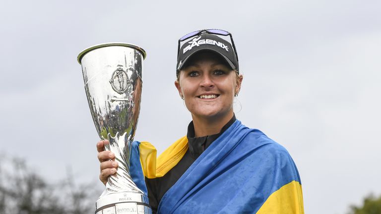Anna Nordqvist from Sweden holds her trophy after winning the Evian Championship tournament on September 17, 2017 in the French Alps town of Evian-les-Bain