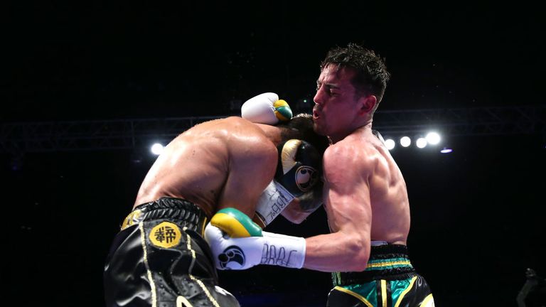 Anthony Crolla of Great Britain (White Gloves) fights Jorge Linares of Venezuela.
