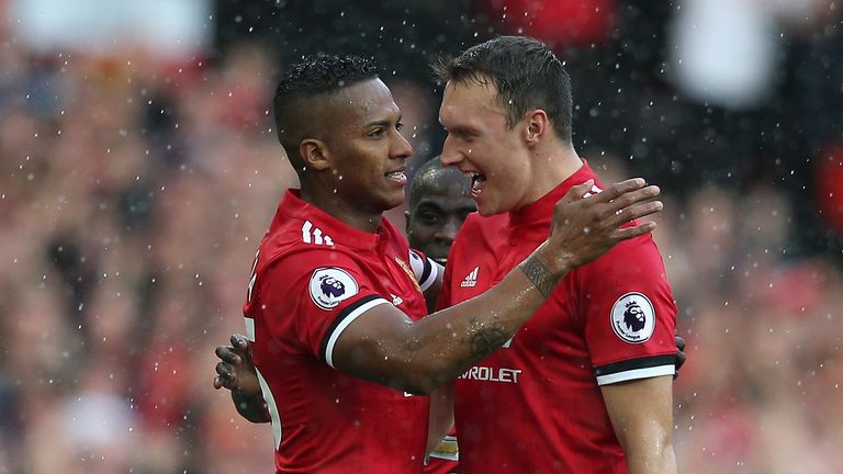 Antonio Valencia of Manchester United celebrates scoring his side's first goal with Phil Jones during the Premier League match v Everton