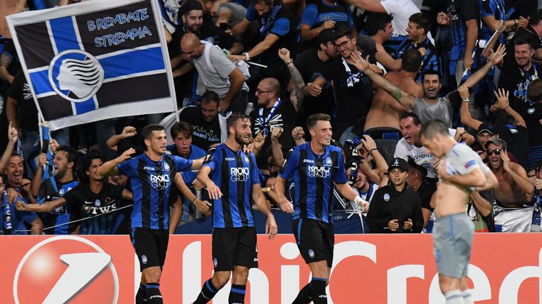 Bryan Cristante (2L) celebrates after putting Atalanta 3-0 up