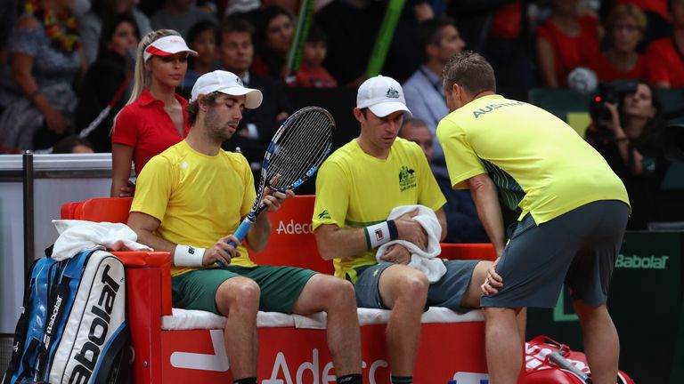 BRUSSELS, BELGIUM - SEPTEMBER 16:  John Peers and Jordan Thompson of Australia with support from team captain Lleyton Hewitt in the doubles match against R