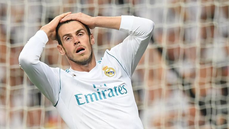 Gareth Bale gestures after seeing his effort saved