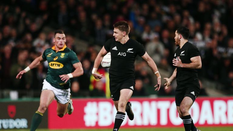 AUCKLAND, NEW ZEALAND - SEPTEMBER 16:  Beauden Barrett of the All Blacks flicks a back pass to setup teammate Nehe Milner-Skudder for a try during the Rugb