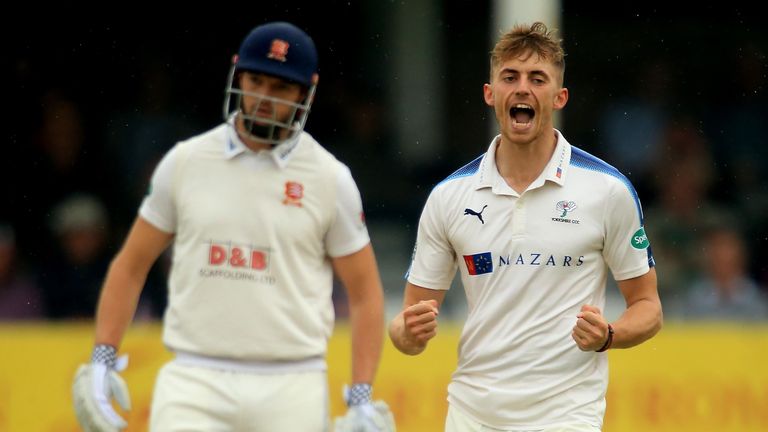 Ben Coad of Yorkshire celebrates the dismissal of Varun Chopra of Essex during day one of the Specsavers County Championship