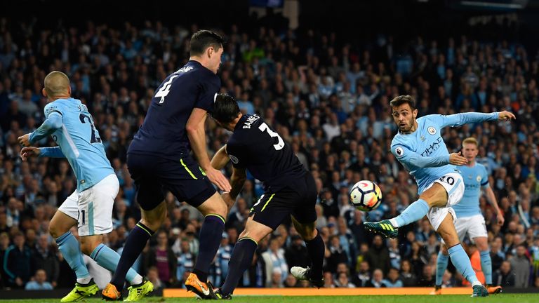 Bernardo Silva takes a shot at goal for Manchester City against Everton