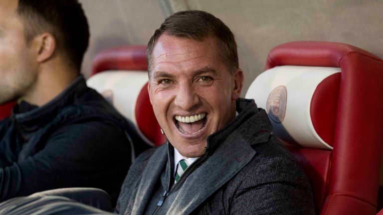 Celtic manager Brendan Rodgers in good humour in the dug-out at Hamilton