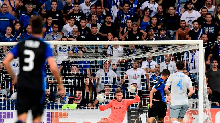 Midfielder Brian Cristante (2R) scores Atalanta's third goal