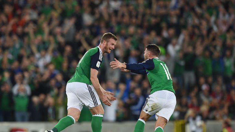 BELFAST, NORTHERN IRELAND - SEPTEMBER 04: Chris Brunt of Northern Ireland celebrates after scoring his sides second goal  during the FIFA 2018 World Cup Qu