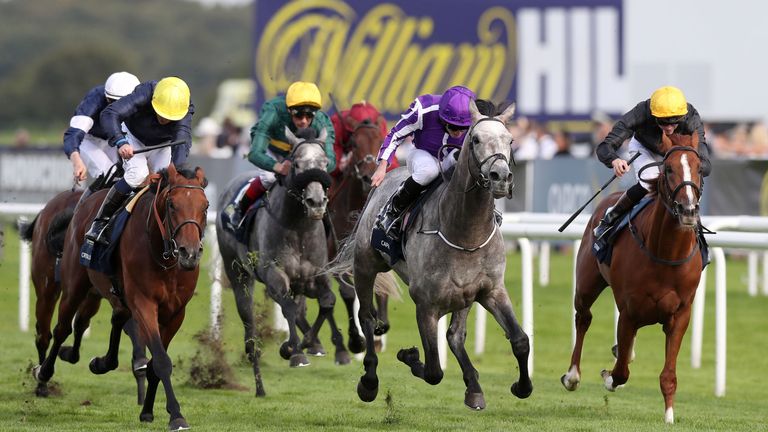 Capri (second right) ridden by Ryan Moore wins The William Hill St Leger Stakes, during day four of the William Hill St. Leger Festival at Doncaster Raceco