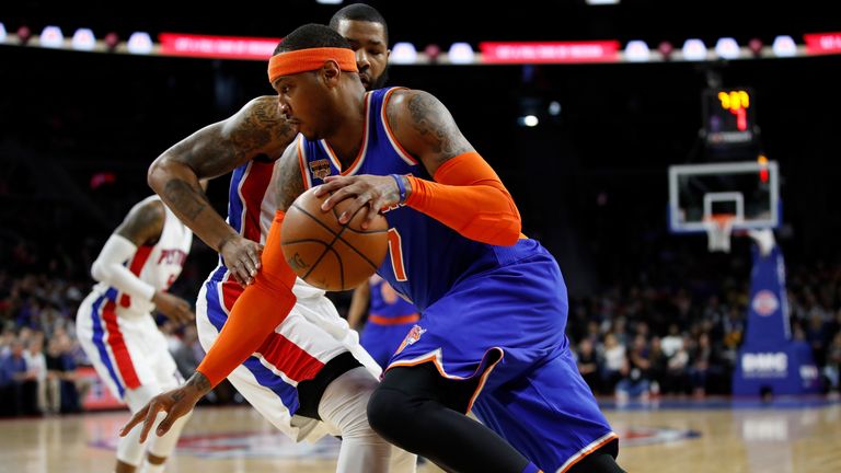 AUBURN HILLS, MI - MARCH 11: Carmelo Anthony #7 of the New York Knicks drives around Tobias Harris #34 of the Detroit Pistons during the first half at the 