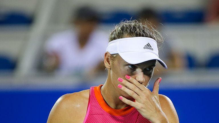WUHAN, CHINA - SEPTEMBER 26:  Caroline Wozniacki of Denmark reacts during the match against Maria Sakkari of Greece on Day 3 of 2017 Dongfeng Motor Wuhan O
