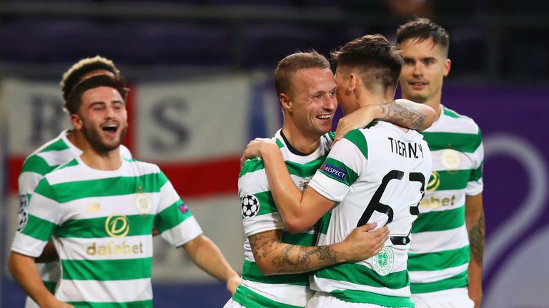 BRUSSELS, BELGIUM - SEPTEMBER 27:  Leigh Griffiths of Celtic celebrates scoring his sides first goal with team mates during the UEFA Champions League group