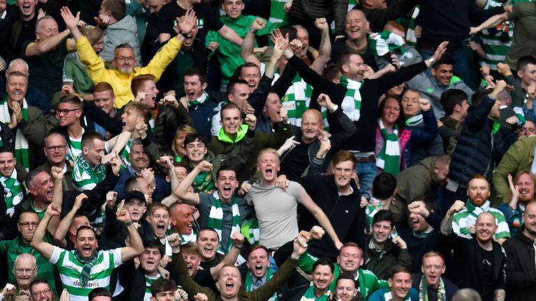 Celtic's players and supporters celebrate Tom Rogic's opener