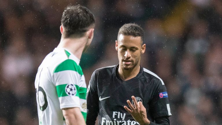 PSG's Neymar raises three fingers to Celtic's Anthony Ralston to remind him of the current score