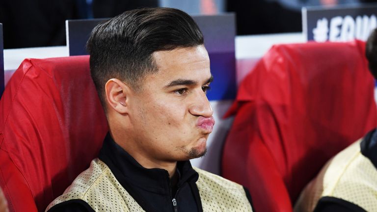 Philippe Coutinho looks on from the bench prior to the UEFA Champions League Group E football match between Liverpool and Sevilla at Anfield