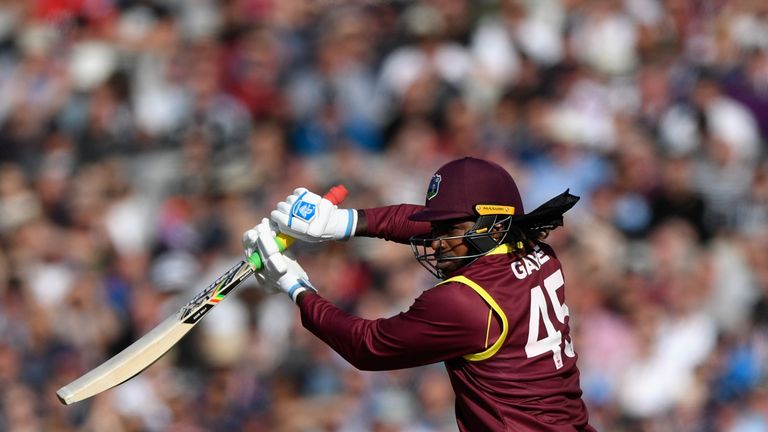 MANCHESTER, ENGLAND - SEPTEMBER 19:  West Indies batsman Chris Gayle hits out during the 1st Royal London One Day International match between England and W