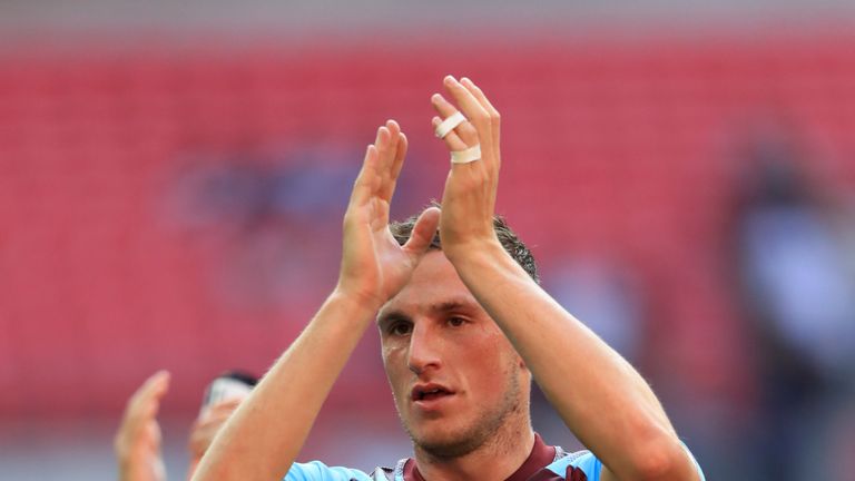 Burnley's Chris Wood applauds the fans after the 1-1 draw with Tottenham at Wembley in the Premier League