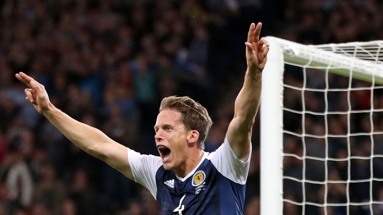 Christophe Berra of Scotland (4) celebrates as he scores against Malta