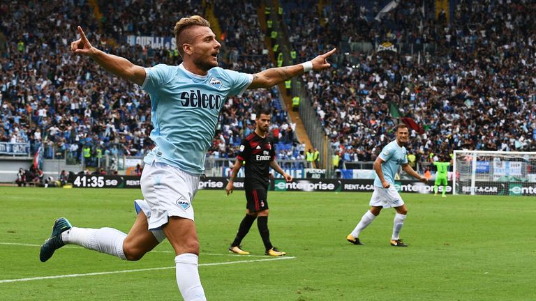 TOPSHOT - Lazio's forward from Italy Ciro Immobile celebrates after scoring his second goal during the Italian Serie A football match Lazio vs AC Milan on 